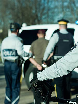 Officers arresting a man