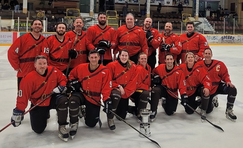 Group photograph of the Revelstoke RCMP hockey team.